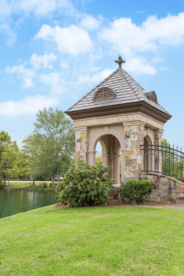 exterior space with a water view