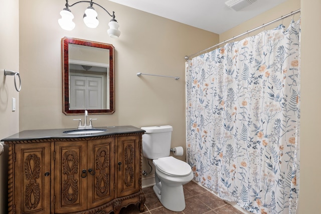 bathroom with tile patterned flooring, vanity, toilet, and a shower with shower curtain