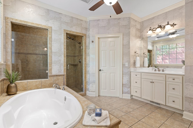 bathroom featuring vanity, shower with separate bathtub, crown molding, and ceiling fan