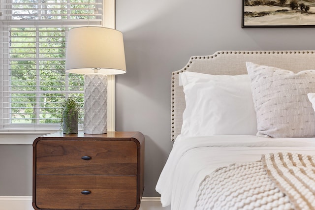 bedroom featuring multiple windows