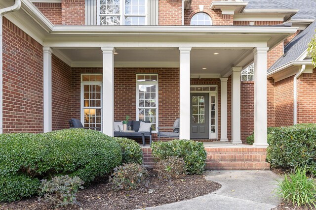 property entrance featuring a porch