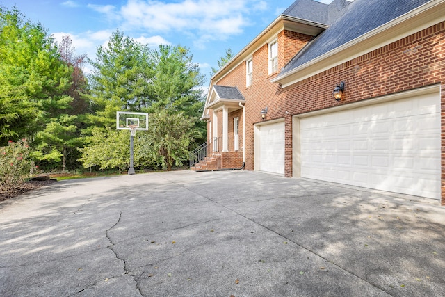 view of side of property featuring a garage