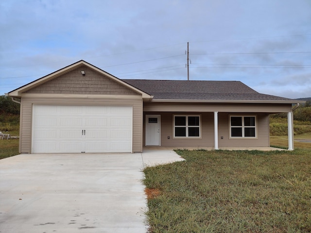 single story home with a garage and a front yard