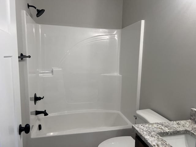 full bathroom featuring vanity, shower / washtub combination, and toilet