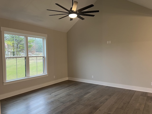 unfurnished room featuring ceiling fan, dark hardwood / wood-style flooring, and vaulted ceiling