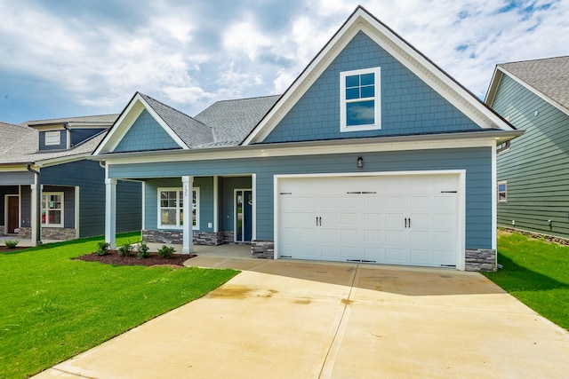 craftsman-style home featuring a front yard and a porch