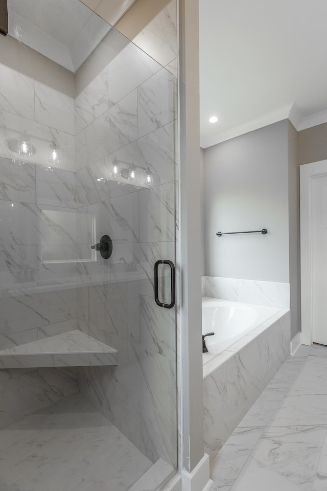 bathroom featuring independent shower and bath and crown molding