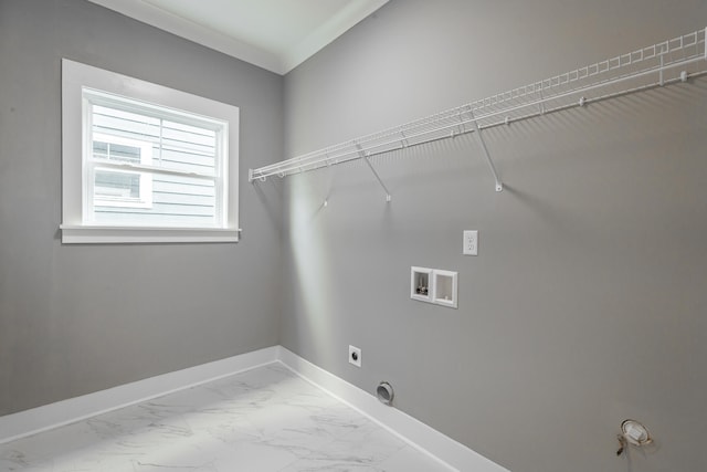 laundry area with hookup for a washing machine, hookup for an electric dryer, and ornamental molding