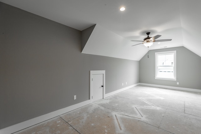 bonus room featuring lofted ceiling and ceiling fan