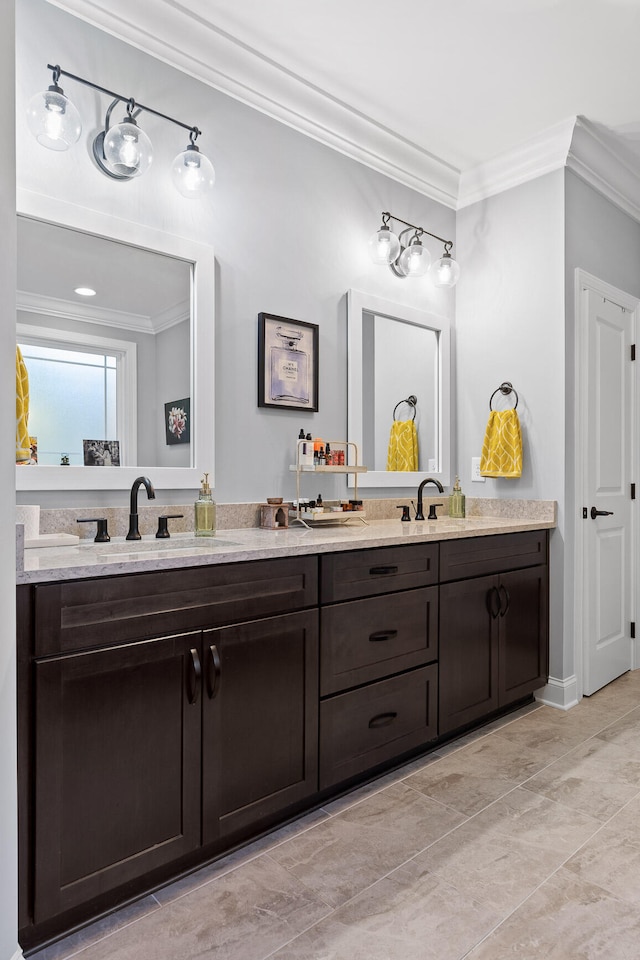 bathroom featuring vanity and crown molding