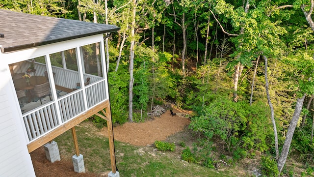 view of yard featuring a sunroom