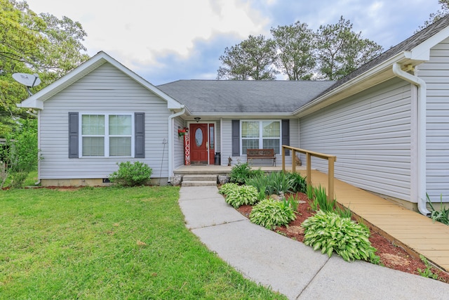 single story home with a front yard