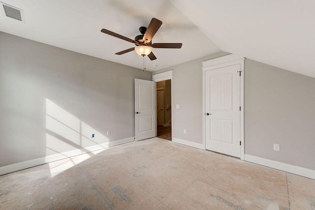 unfurnished bedroom with ceiling fan and lofted ceiling