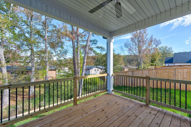 wooden deck with ceiling fan