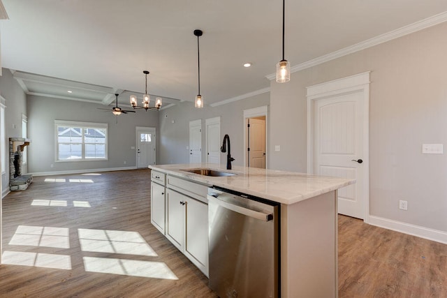 kitchen featuring a kitchen island with sink, light hardwood / wood-style flooring, and stainless steel dishwasher