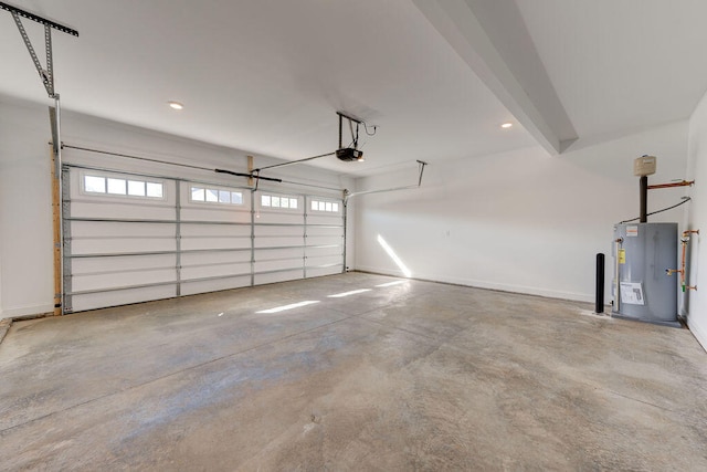 garage with electric water heater and a garage door opener