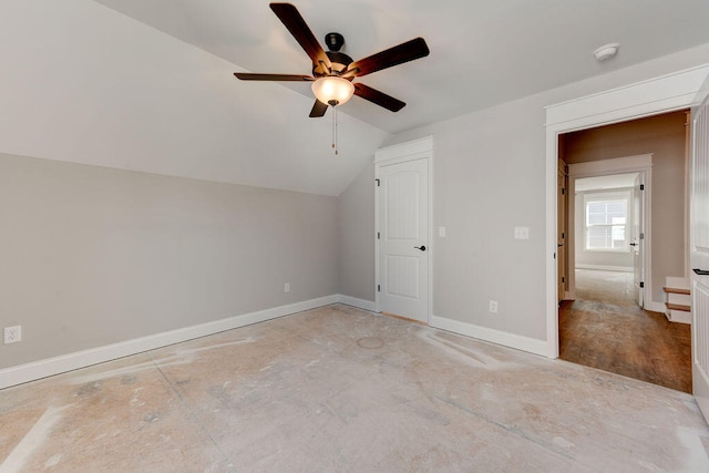 bonus room with vaulted ceiling and ceiling fan