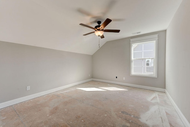 additional living space with ceiling fan and vaulted ceiling