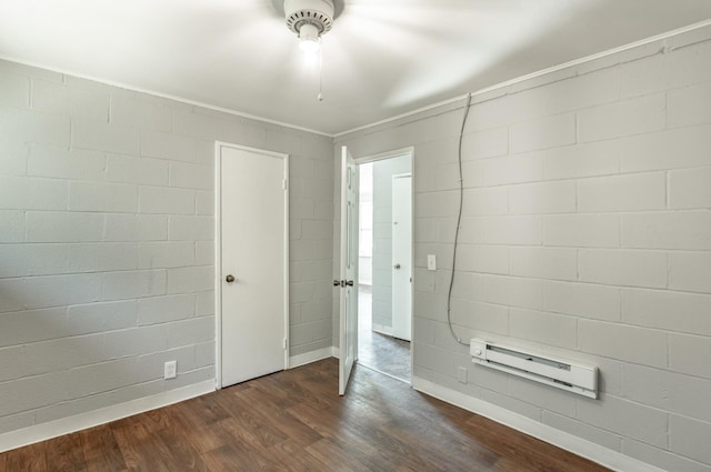 unfurnished bedroom featuring dark hardwood / wood-style floors