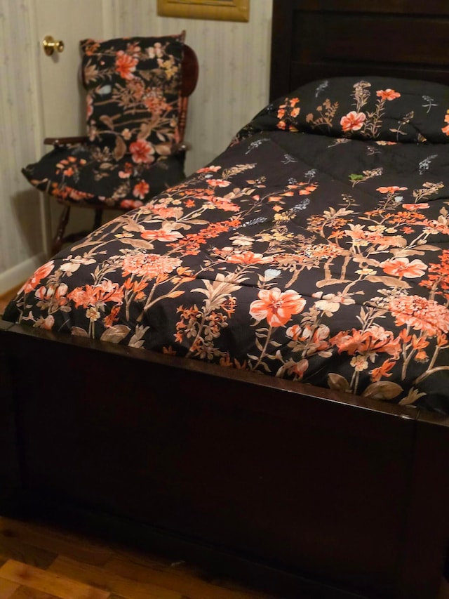 bedroom featuring wood-type flooring