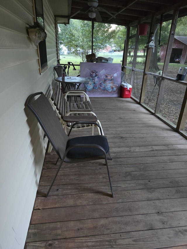 wooden deck with ceiling fan