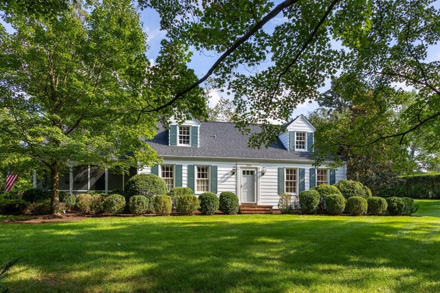 2050 Harle Ave NW, Cleveland, TN 37311 - new england style home featuring a shingled roof and a front lawn