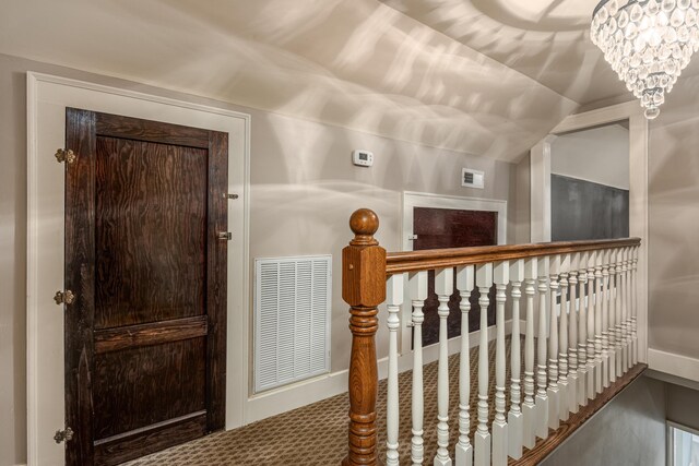 2050 Harle Ave NW, Cleveland, TN 37311 - bonus room with carpet, visible vents, and a notable chandelier