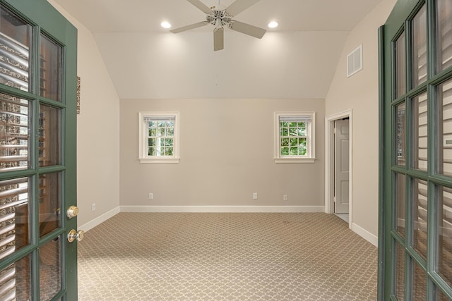 unfurnished room with ceiling fan, plenty of natural light, and carpet flooring