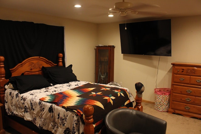 carpeted bedroom featuring ceiling fan