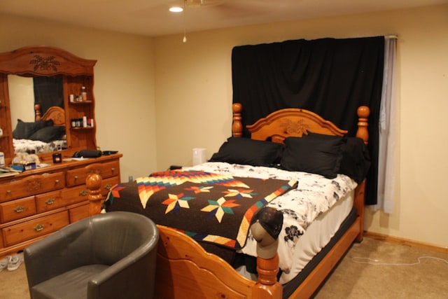 bedroom with light colored carpet