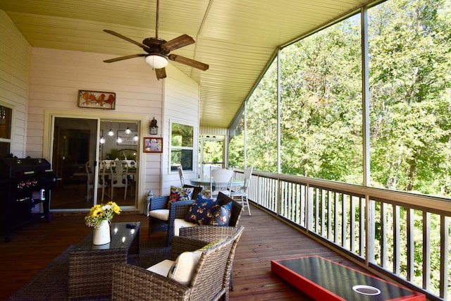 wooden deck with ceiling fan