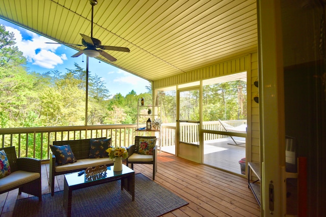 exterior space with ceiling fan