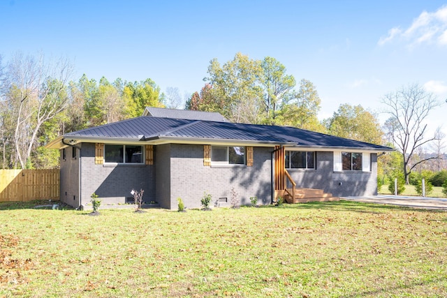 single story home with a front yard