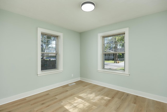 empty room featuring light hardwood / wood-style floors