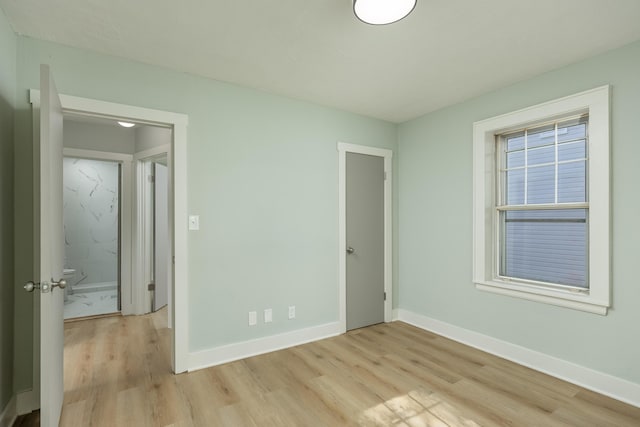 unfurnished bedroom with light hardwood / wood-style floors