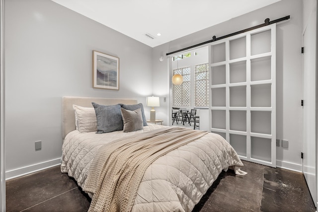 bedroom with a barn door