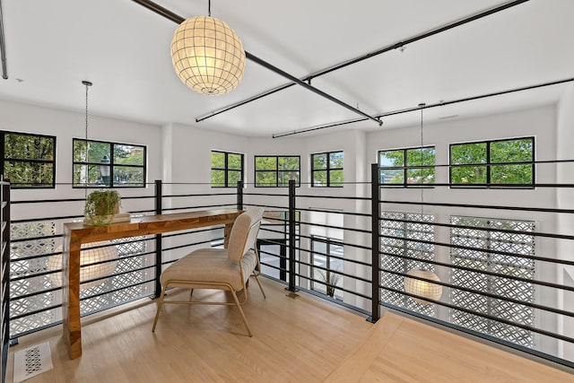 office space with light hardwood / wood-style floors