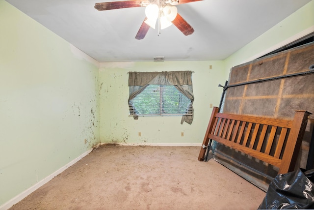 unfurnished bedroom with carpet and ceiling fan