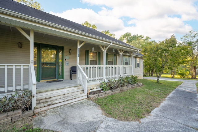 entrance to property with covered porch