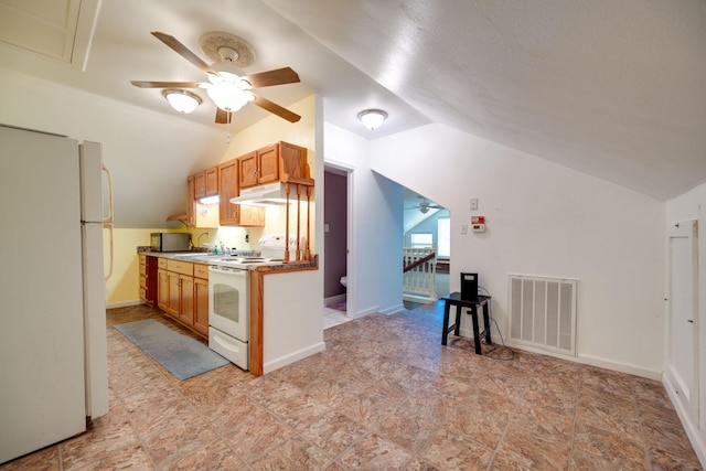 kitchen with ceiling fan, sink, vaulted ceiling, and white appliances