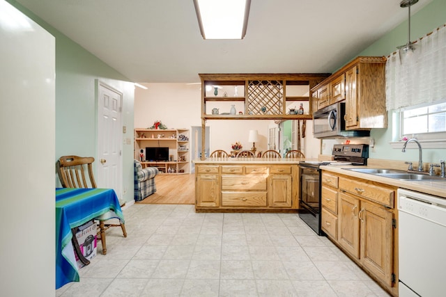 kitchen featuring kitchen peninsula, dishwasher, black electric range, light hardwood / wood-style floors, and sink