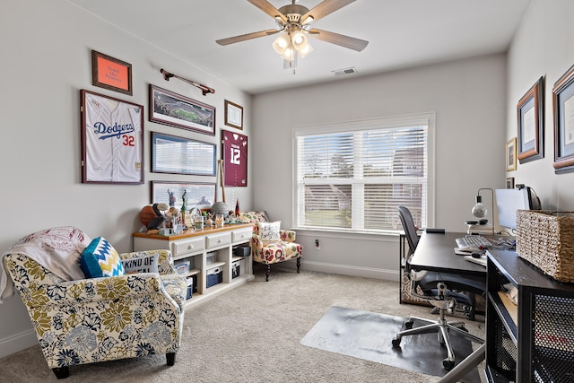 home office featuring carpet and ceiling fan