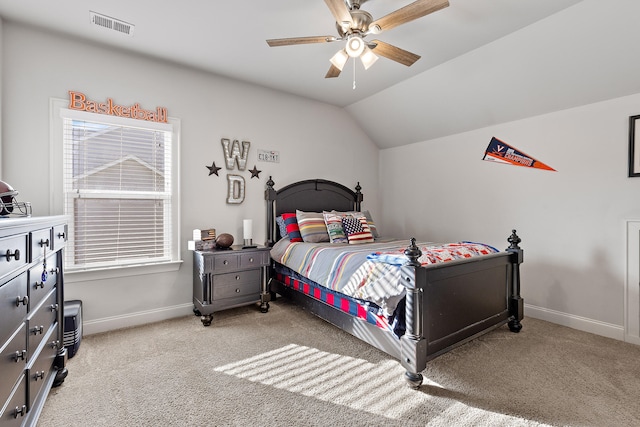 carpeted bedroom with lofted ceiling and ceiling fan