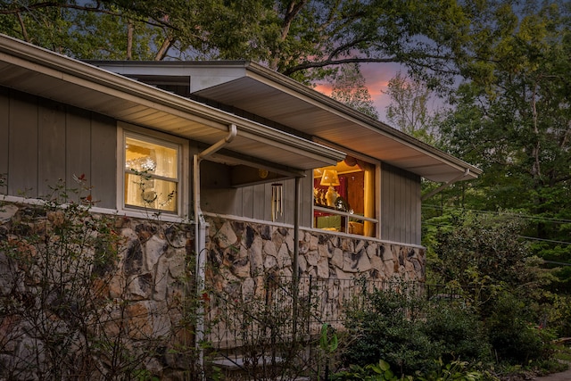 view of property exterior at dusk