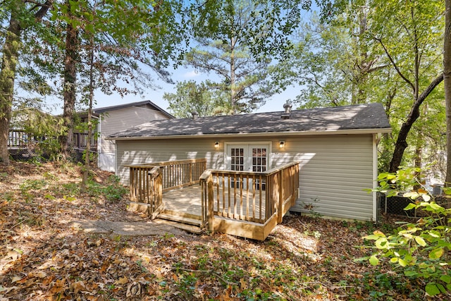 rear view of house featuring a deck