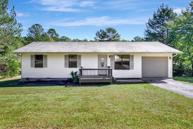 single story home with a garage and a front lawn