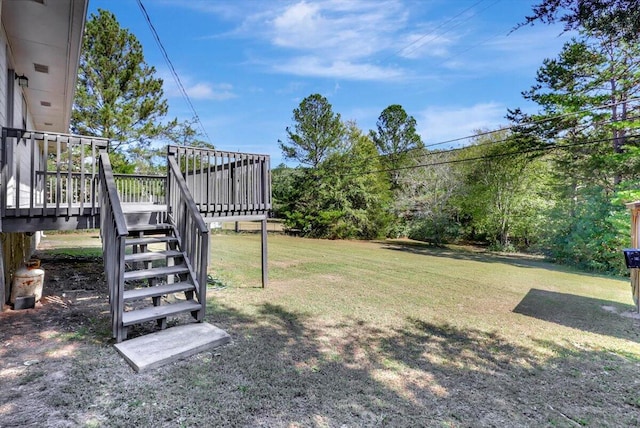 view of yard with a wooden deck