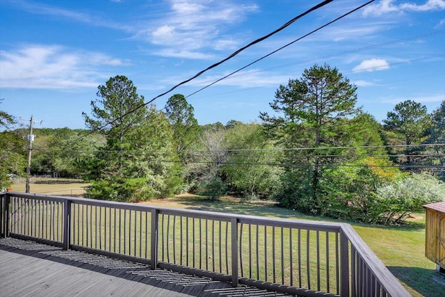 wooden deck with a yard