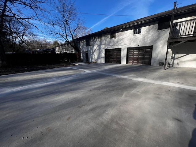 view of property exterior featuring a garage