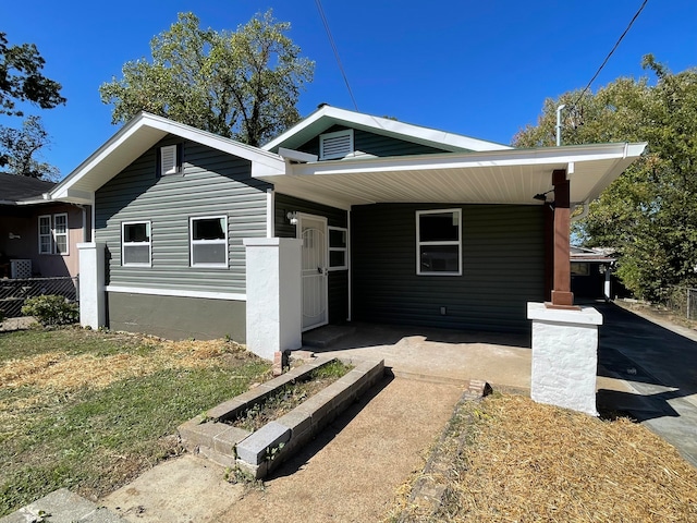 view of front of house with a carport